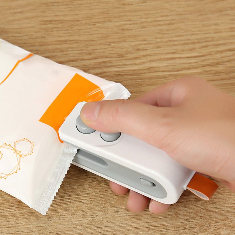 💥Limited-time offer: 50% off-2-IN-1 Mini Portable Rechargeable Bag Sealing and Cutter Machine