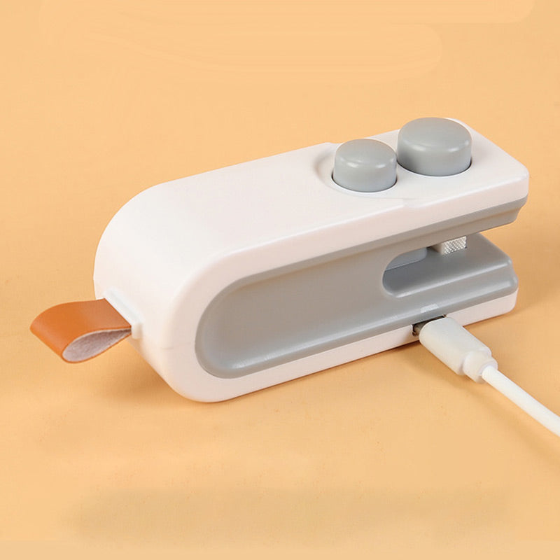 💥Limited-time offer: 50% off-2-IN-1 Mini Portable Rechargeable Bag Sealing and Cutter Machine
