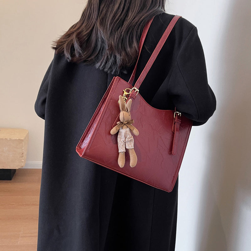 🐰Women's Trendy Shoulder Bag with Doll Pendant