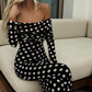 Elegant dress with polka dot pattern and bare shoulders