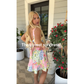 🌸 Romance blooms! A floral-print sleeveless mini skirt for a summery elegance 👗
