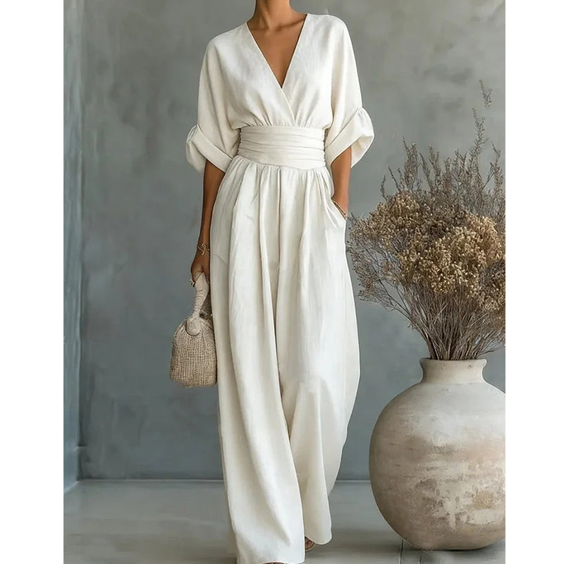 👗 49% OFF NOW! ✨ Elegant V-Neck Wide-Leg Jumpsuit – Flattering Waist Sash, Soft Breathable Fabric & Relaxed Fit 🦋