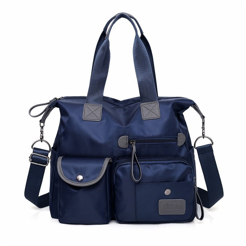 🥳2026 HOT SALE🥳💞50K+ SOLD!👜🌟 50% OFF! Large Waterproof Tote Bag – Spacious main compartment, multiple pockets & 3 carrying ways. Lightweight Oxford fabric – perfect for work, shopping & travel! 💪✨